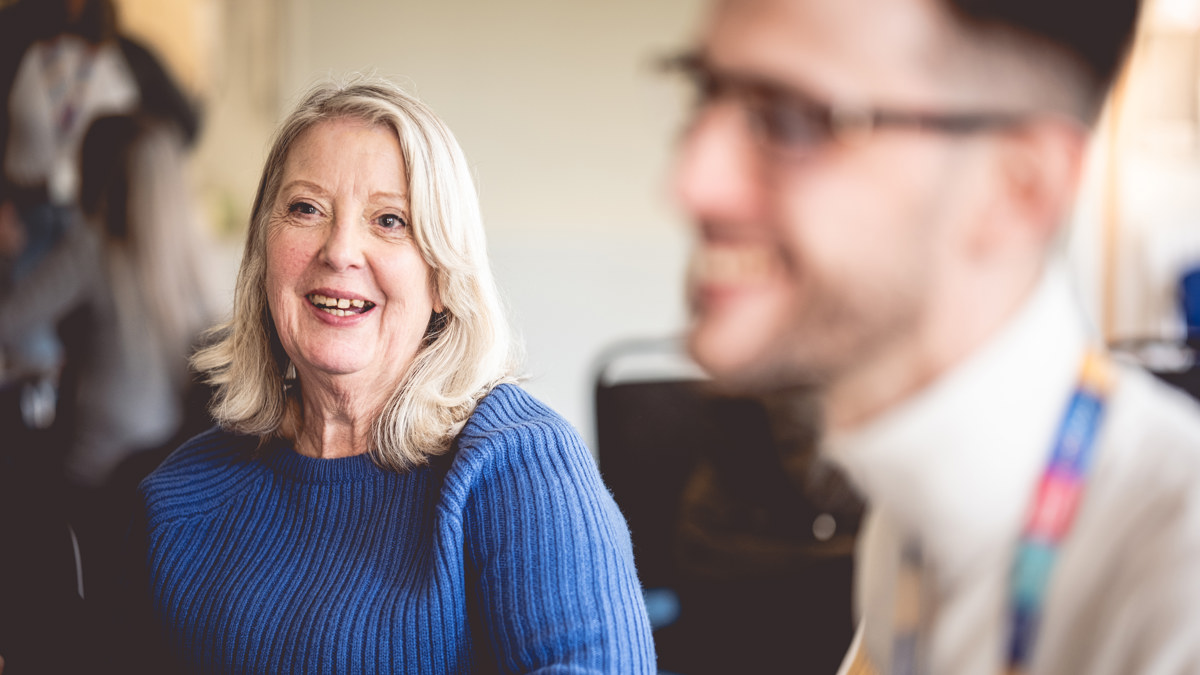 A Moat colleague chats with a Moat customer