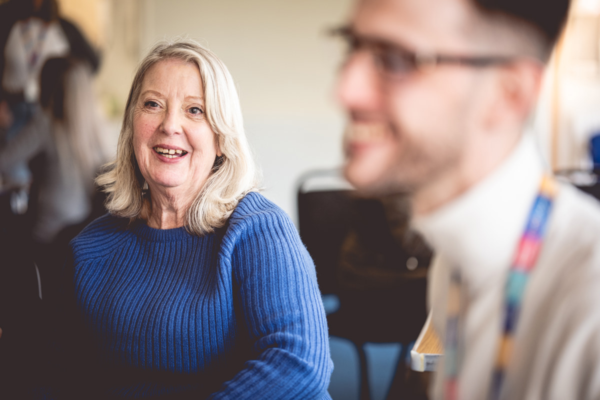 A Moat colleague chats with a Moat customer
