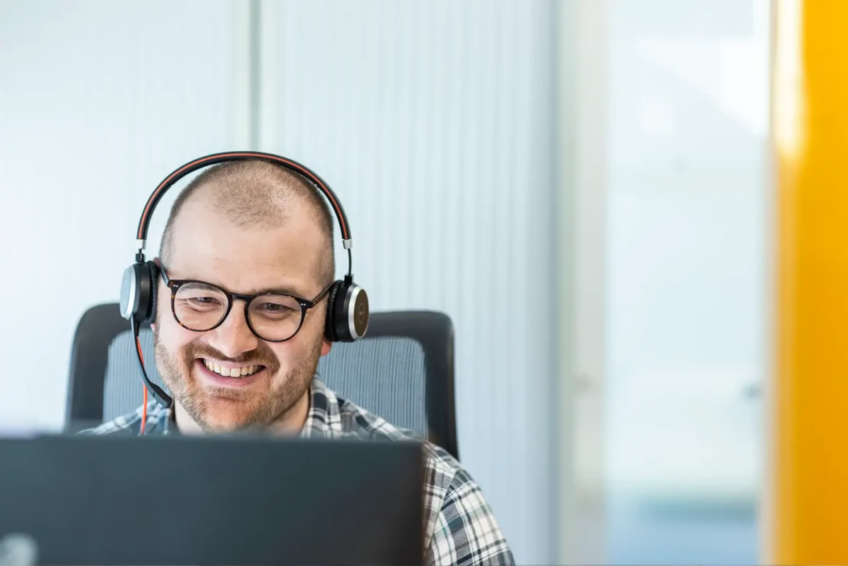 Sam at desk