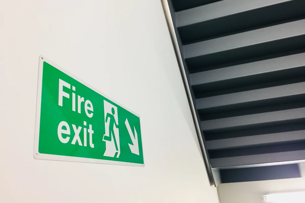 Image shows a fire exit sign on a stairwell