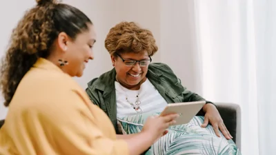 Women Looking At Tablet