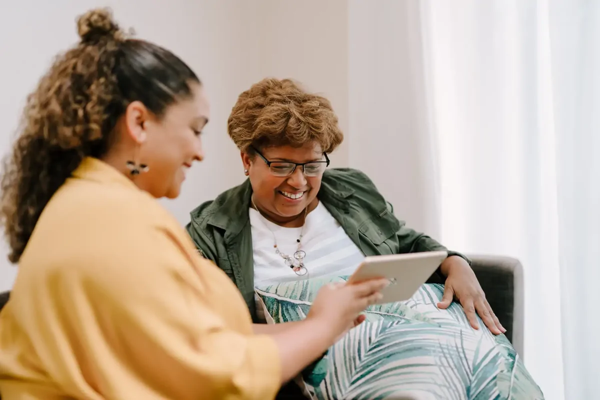 Women Looking At Tablet